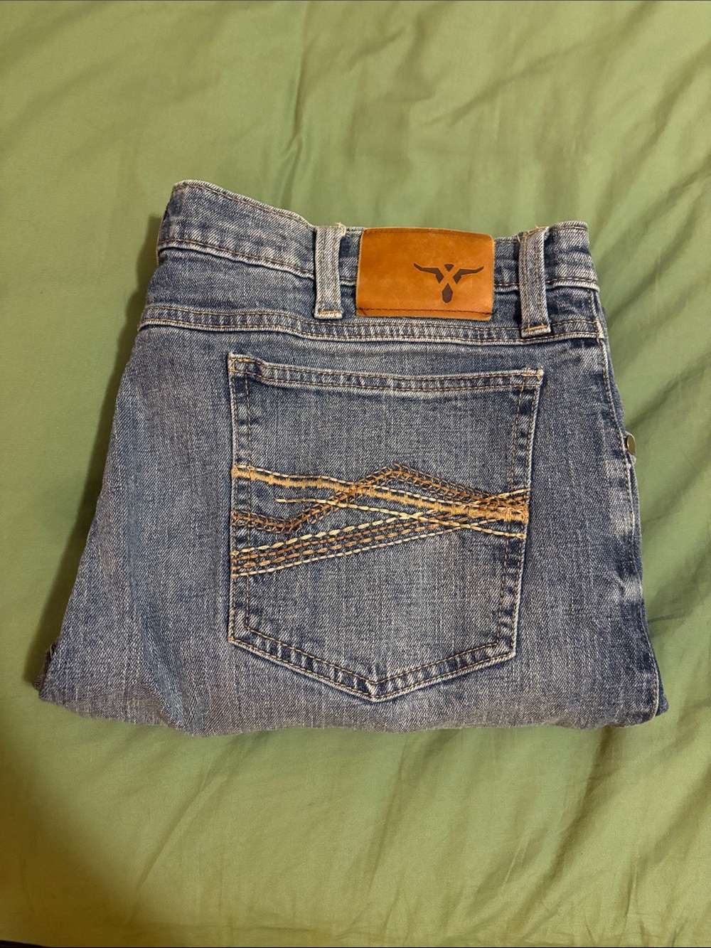 Men's Light Blue Bootcut Jeans with Tan Patch